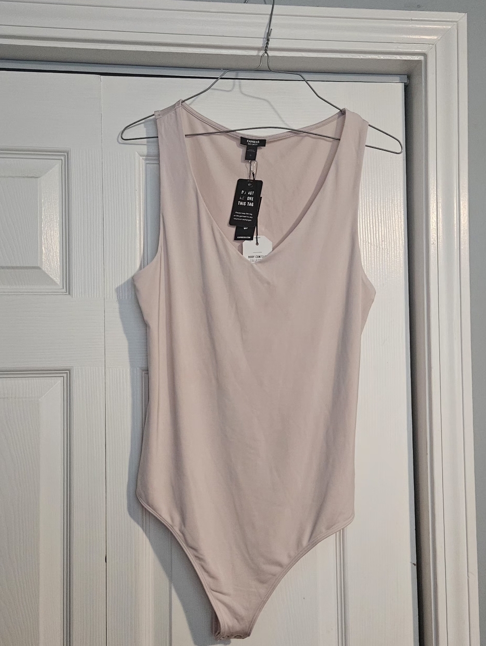 NWT Express Body Contour Collection Light Pink Bodysuit size M